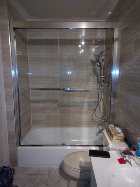 Tub & Glass Enclosure — Bathrooms project by NH Total Construction