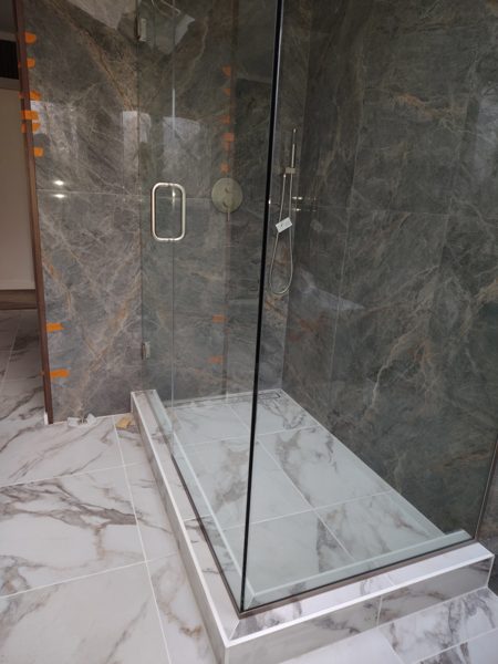 Marble Walk-In Shower — Bathrooms project by NH Total Construction