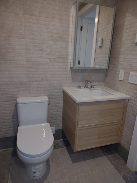 Bathroom with Custom Vanity — Bathrooms project by NH Total Construction